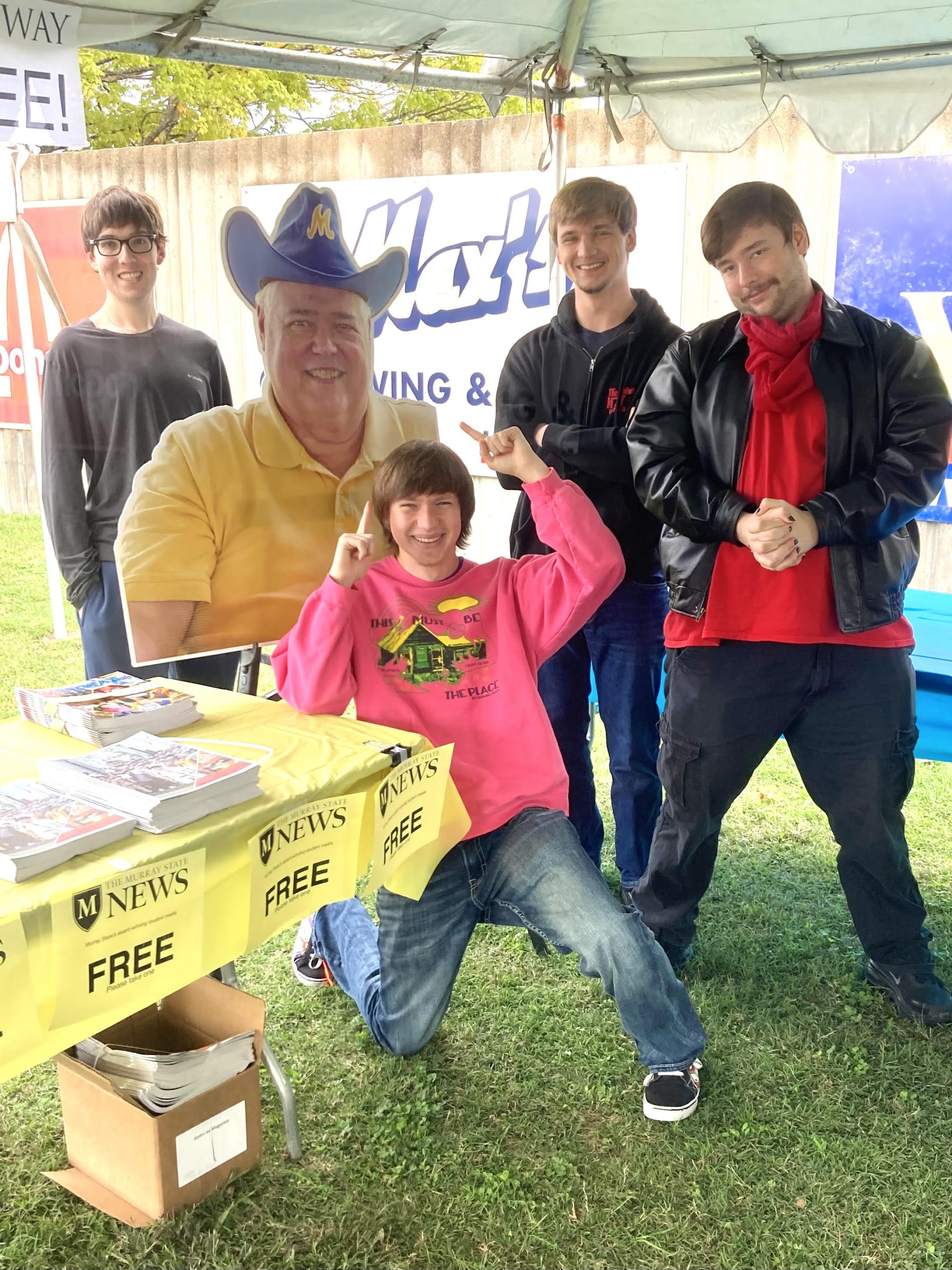 Members of the MSU Ads Club pose with a cutout of Dr. Bob McGaughey, legendary former JMC department chair. From left, Aidan Flagge, Joshua Suttles, Derek Hess and Kyle Stone.